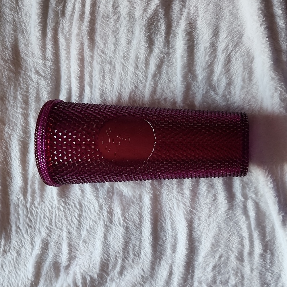 Plum studded Starbucks cup